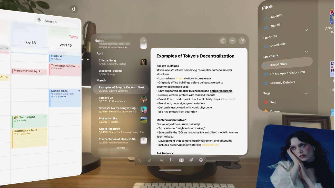 A user’s view on Apple Vision Pro, with several app windows visible.