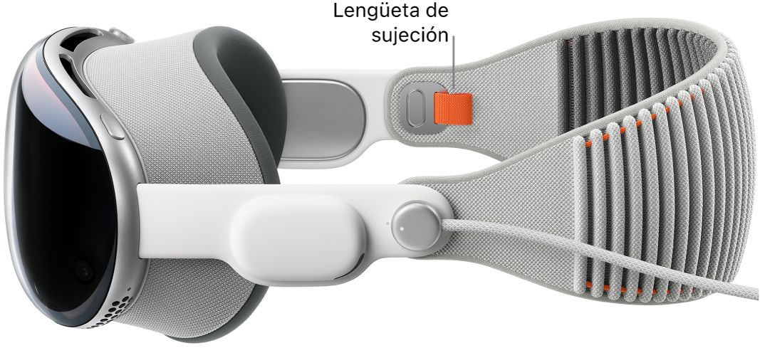 Apple Vision Pro con la banda Solo Knit colocada. Se puede ver una lengüeta de sujeción de color naranja en la cara interna de la banda Solo Knit.