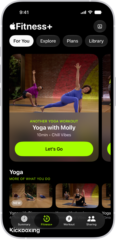 The For You tab in Apple Fitness+ showing a recommended workout at the top of the screen and a row of recommended yoga workouts at the bottom.