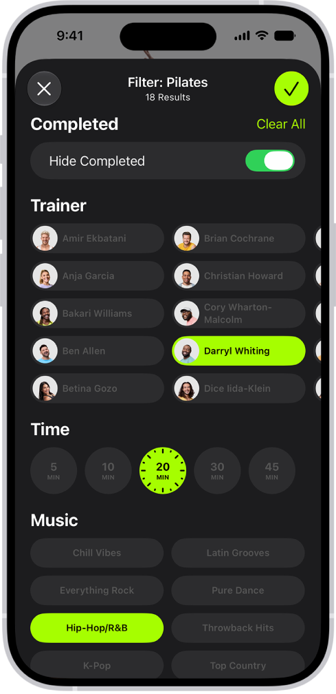 The Apple Fitness+ screen showing options to sort and filter workouts. At the top is an option to hide completed workouts. A list of trainers and time intervals is at the center of the screen. At the bottom is a list of music genres.