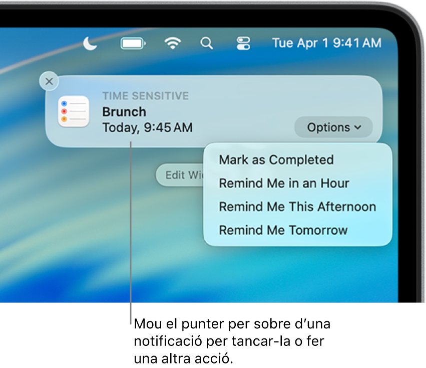 Notificació d’app d’un recordatori a l’angle superior dret de l’escriptori i que inclou les opcions “Marca com a completat” o “Recorda‑m’ho d’aquí a una hora”.