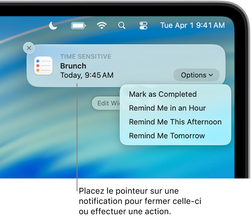 Une notification d’app pour un rappel dans le coin supérieur droit du bureau, y compris les options Marquer comme terminé ou Me le rappeler dans 1 heure.