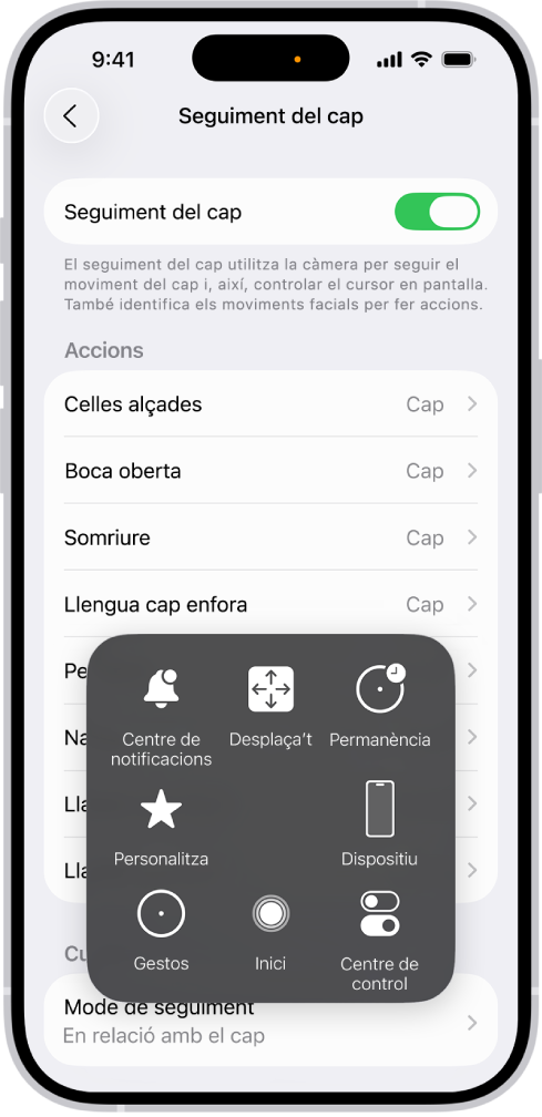 Un iPhone amb el seguiment de cap activat. Es veu el menú de l’AssistiveTouch, i s’hi mostren es mostren els controls següents: “Centre de notificacions”, “Desplaçament”, “Permanència”, “Dispositiu”, “Centre de control”, “Inici”, “Gestos” i “Personalitzat”.