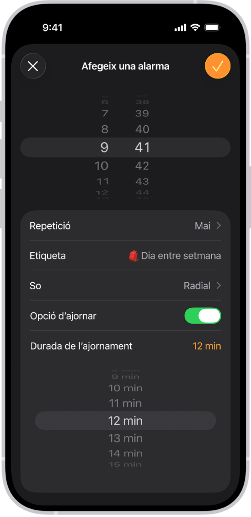 La pantalla per afegir una alarma a l’app Rellotge. S’activa el botó “Ajorna” i es personalitza la durada de l’ajornament a 12 minuts.