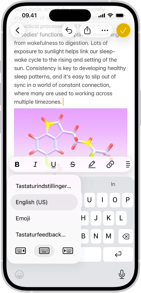 Menuen Tastaturindstillinger er åben og viser tre muligheder: Engelsk (USA), Emoji og Tastaturfeedback. Nederst i menuen, fra venstre til højre, er der knapper til venstrehåndslayout, standardlayout og højrehåndslayout. Knappen til standardlayout er valgt.
