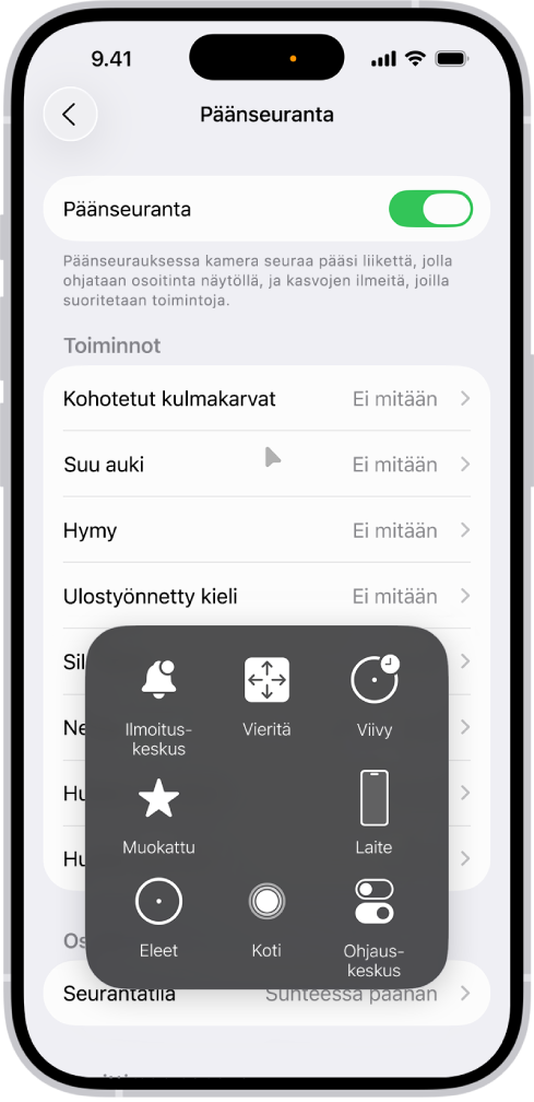 iPhone, jossa on päänseuranta päällä. Näkyvissä on AssistiveTouch-valikko, jossa näkyvät seuraavat säätimet: Ilmoituskeskus, Vieritys, Viipyminen, Laite, Ohjauskeskus, Koti, Eleet ja Muokattu.