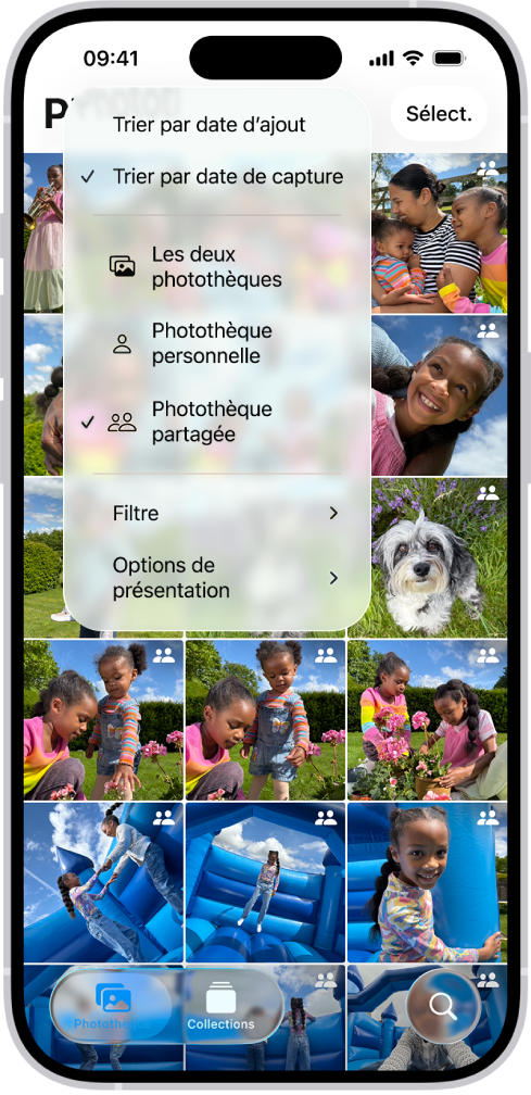 Une photothèque partagée iCloud dans l’app Photos. Le bouton « Photothèque partagée » dans le coin inférieur gauche est sélectionné, et la photothèque partagée est sélectionnée dans une liste d’options de photothèque. Toutes les photos affichées dans la photothèque possèdent une pastille dans le coin supérieur droit indiquant qu’elles appartiennent à une photothèque partagée.