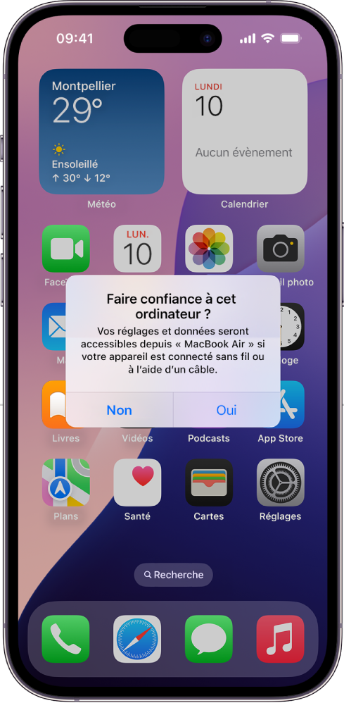 iPad affichant la zone de dialogue « Faire confiance à cet ordinateur ? » lors de la connexion initiale à un MacBook Air.