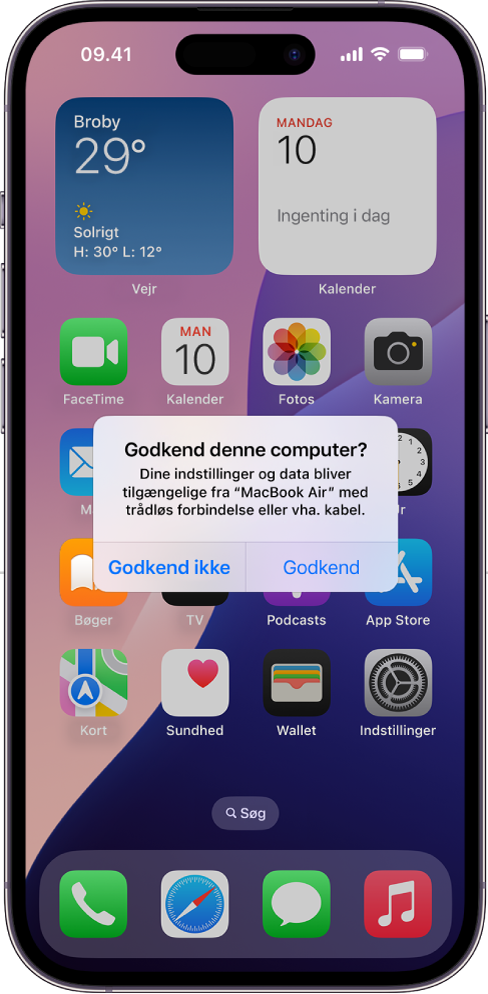 En iPad med dialogen Godkend denne computer? når der først oprettes forbindelse til en MacBook Air.