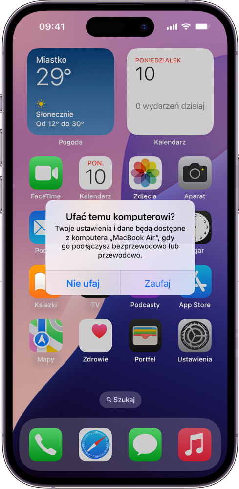 iPad wyświetlający okno dialogowe „Czy ufać temu komputerowi?” po pierwszym podłączeniu do MacBooka Air.