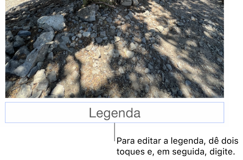 O marcador de posição de legenda, “Legenda”, aparece sob a fotografia; um contorno azul em redor do campo de legenda para mostrar que está selecionado.