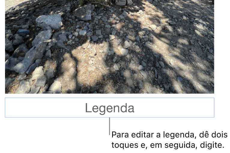 O marcador de posição de legenda, “Legenda”, aparece sob a fotografia; um contorno azul em redor do campo de legenda para mostrar que está selecionado.