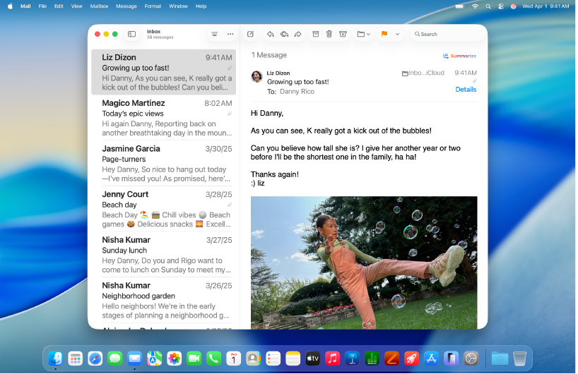 The Mail window is open on the desktop. Emails are displayed with large text.