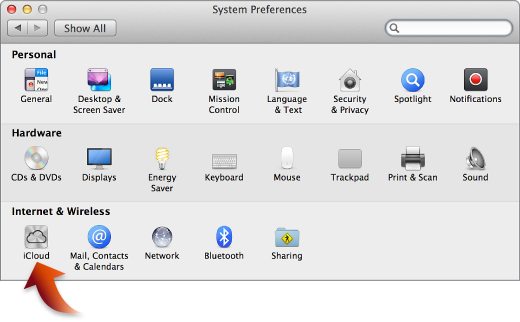 Окно «Настройки системы» и стрелка, указывающая на значок iCloud