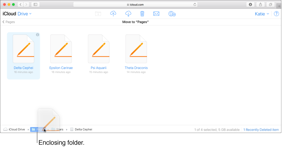 一个文件正被拖入 iCloud.com 上 iCloud 云盘窗口底部的上层文件夹中。