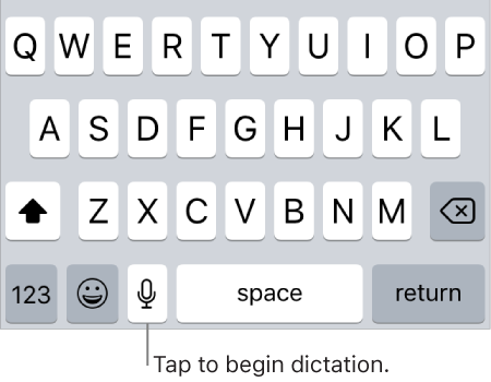 The onscreen keyboard showing the Dictate key to the left of the Space bar.