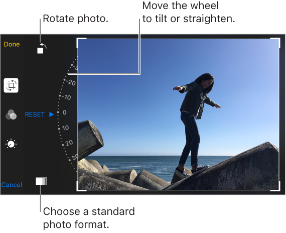 A photo with crop controls showing. Crop, Filter, and Adjustments buttons are aligned vertically along the left and the Ratio button at the bottom. To the right is the Rotate button at the top. The tilt wheel is adjacent to the left side of the photo, with the Reset option showing. A Done button appears at the top-left corner of the screen and Cancel appears at the bottom-left corner.