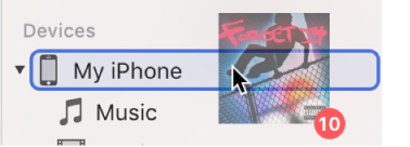 An album being dragged to a device. The device is highlighted with a blue rectangle.
