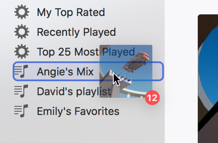 An album being dragged to a playlist. The playlist is highlighted with a blue rectangle.