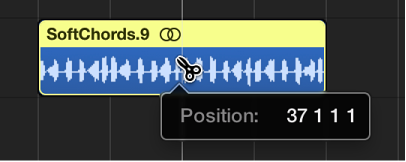 Figure. Splitting a region in the Tracks area using the Scissors tool.