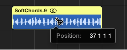 Figure. Splitting a region in the Tracks area using the Scissors tool.