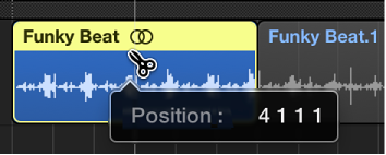 Figure. Scission d’une région à l’aide de l’outil Ciseaux, avec une bulle d’aide affichant la position de la scission.