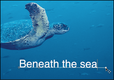 Canvas showing control point being dragged to extend to the end of new text