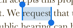 Grab points at either end of a selected word.