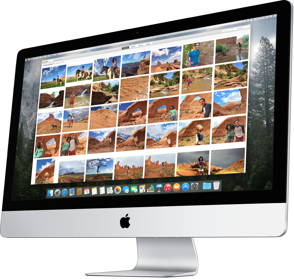 An iMac with the Photos window showing on the screen